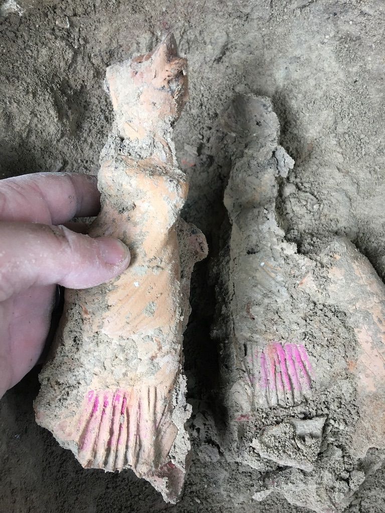 Some of the terracotta figurines still had paint on them.