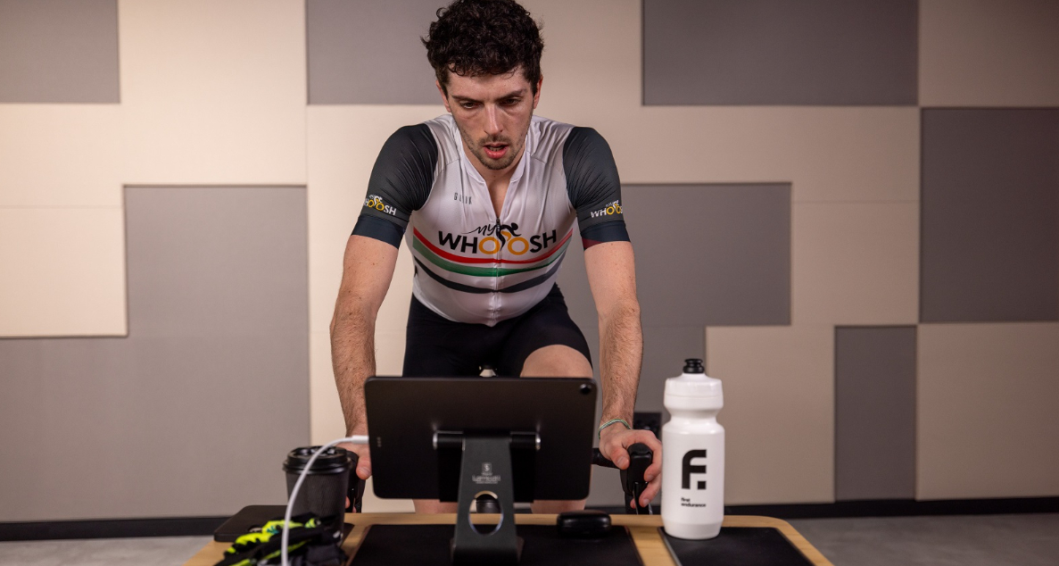 A rider completing a workout on an indoor trainer