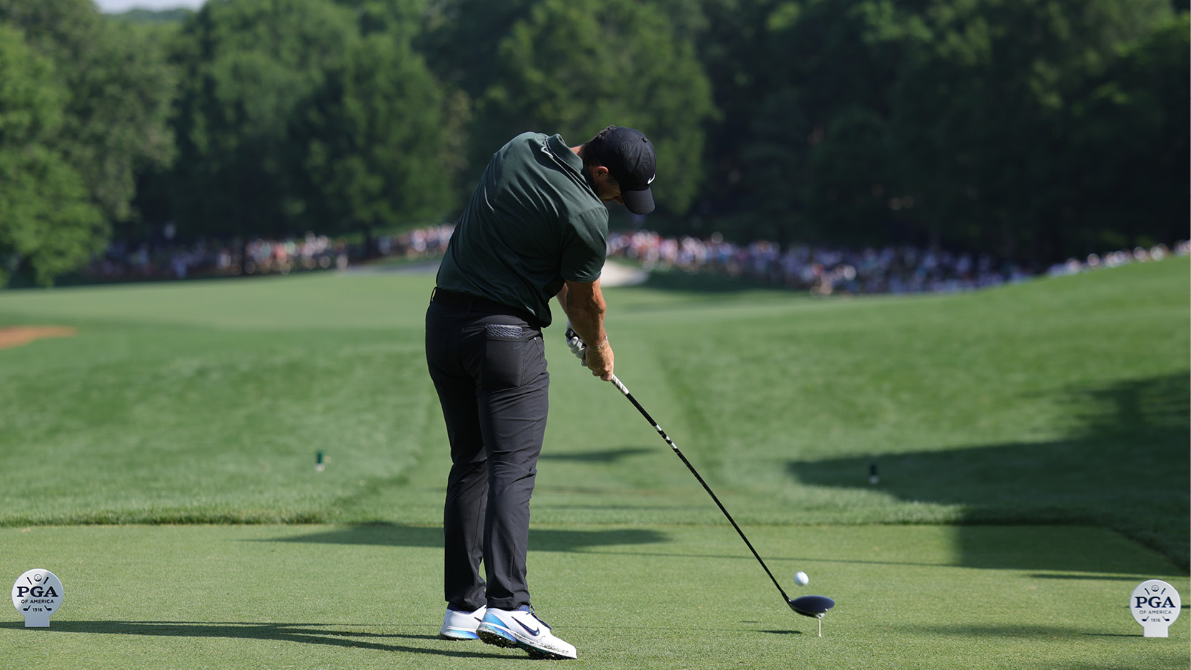 Rory McIlroy hits a driver off the tee