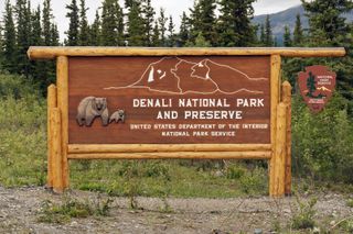The wooden entrance sign to Denali National Park and Preserve in Alaska