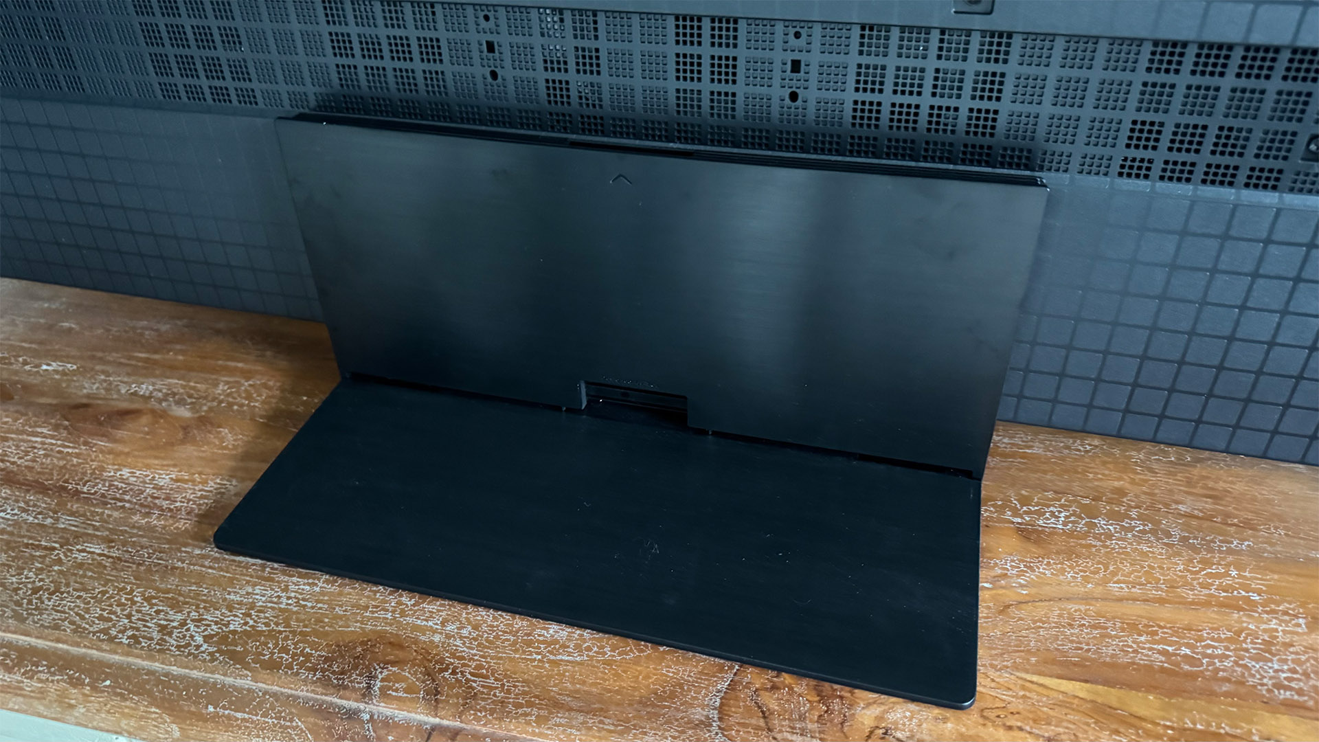 The 65-inch TCL C7K Mini LED TV photographed in a living room
