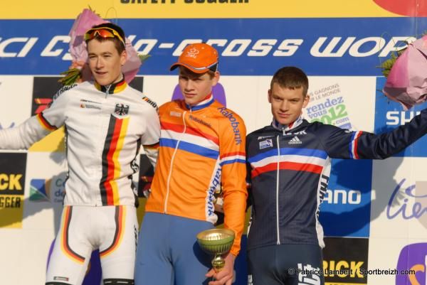 Mathieu Van Der Poel (Netherlands) atop the podium, flanked by Silvio Herklotz (Germany) and Romain Seigle (France).