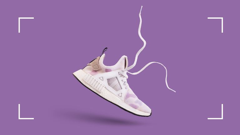 white and purple trainer on purple background 