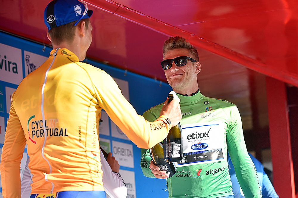 Teammates Tony Martin in yellow and Marcel Kittel in green