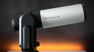 Unistellar eVscope 2 against a dark background