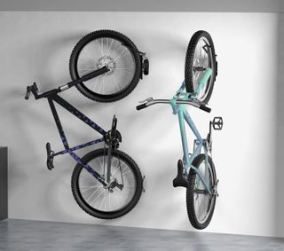 bikes hung vertically on a bike rack