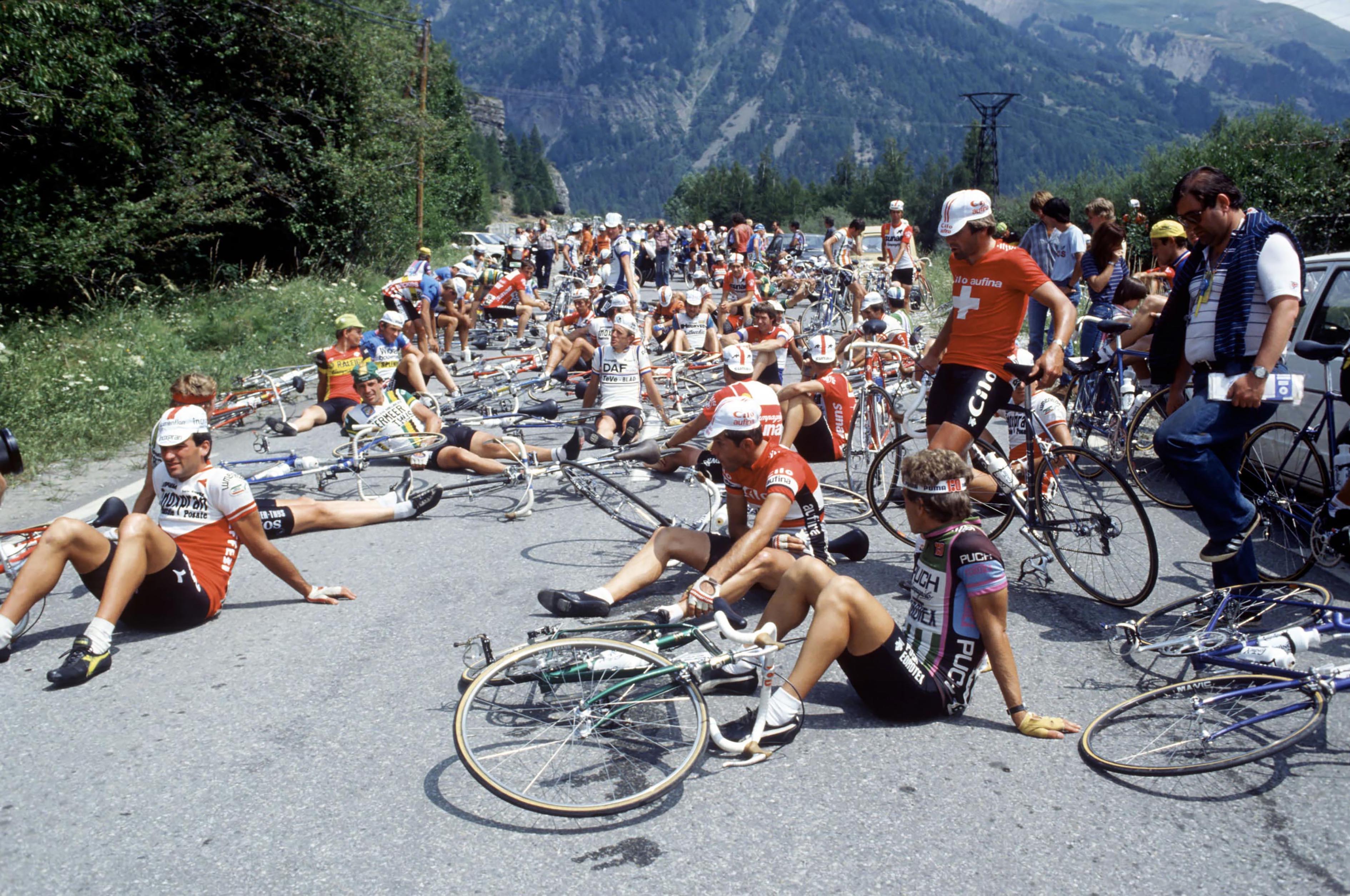 Tour de France 1982, riders sit on the road 