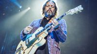 Rich Robinson of the Black Crowes plays a Gretsch White Falcon onstage in Madrid, 2022