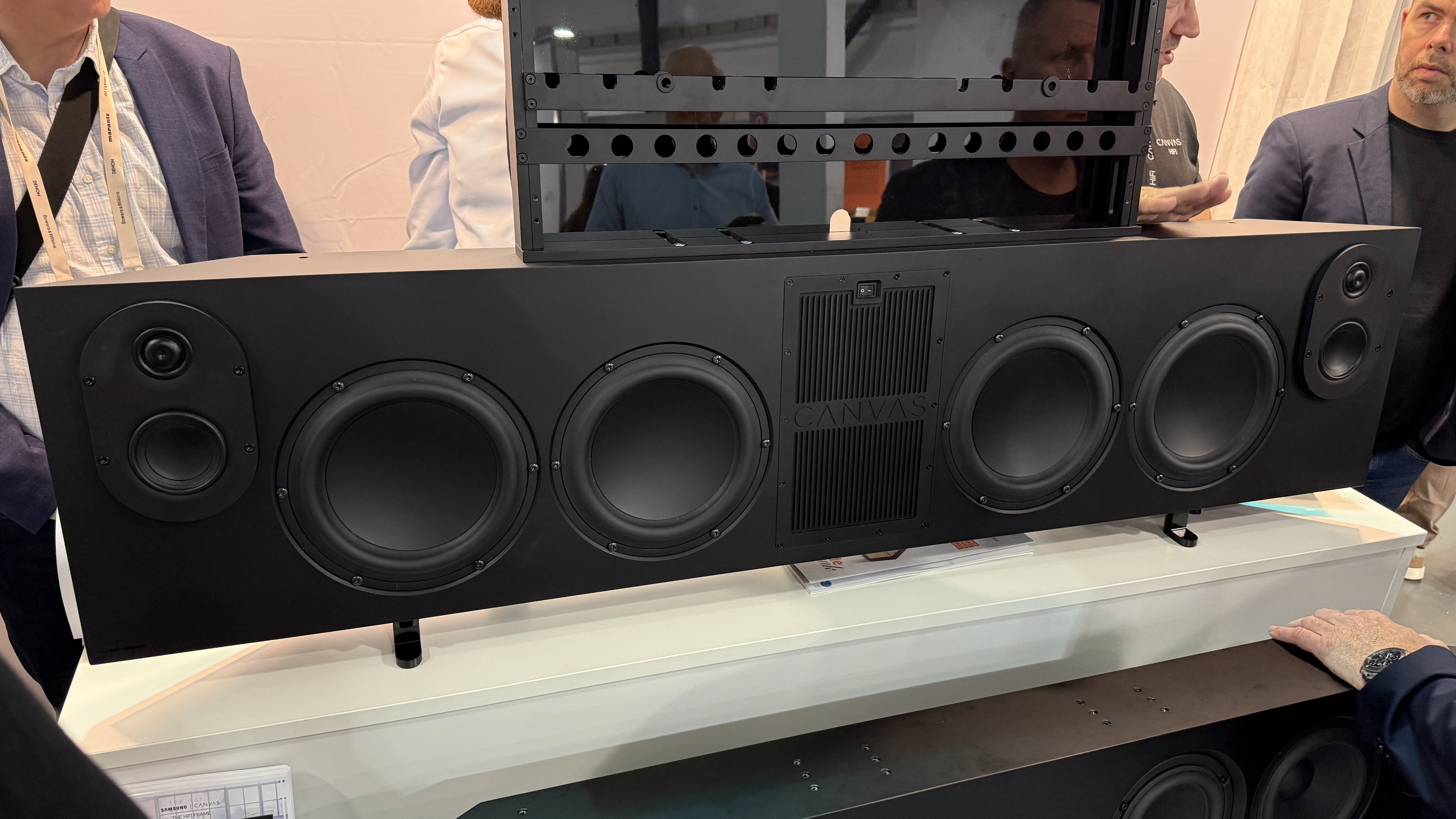 The Canvas L soundbar without a grille, showing its large speaker array