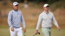 Justin Thomas and Rory McIlroy walking alongside each other at the 2023 Scottish Open