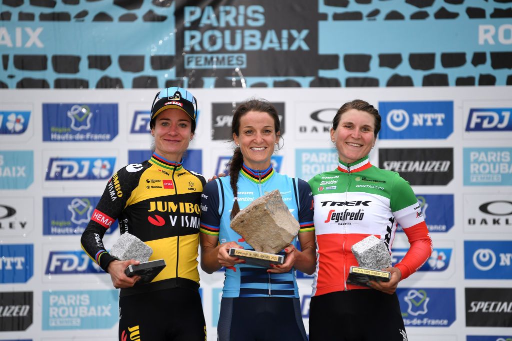 ROUBAIX FRANCE OCTOBER 02 LR Marianne Vos of Netherlands and Jumbo Visma Team on second place stage winner Elisabeth DeignanArmitstead of United Kingdom and Team Trek Segafredo and Elisa Longo Borghini of Italy and Team Trek Segafredo on third place pose with trophies on the podium during the podium ceremony after the 1st ParisRoubaix 2021 Womens Elite a 1164km race from Denain to Roubaix ParisRoubaixFemmes ParisRoubaix on October 02 2021 in Roubaix France Photo by Tim de WaeleGetty Images