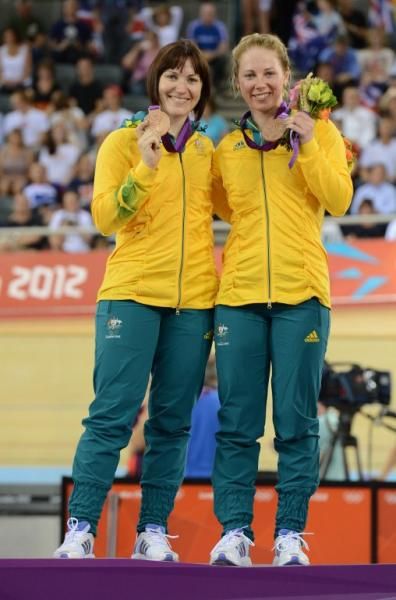 Anna Meares and Kaarle McCulloch (Australia) stand on the dias with their Olympic bronze medals from the team sprint
