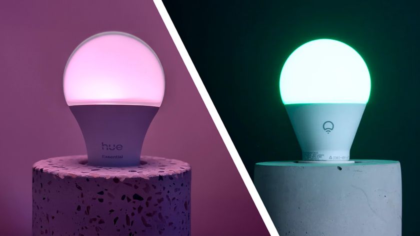 Split image of Philips Hue Essential and Lifx Everyday smart light bulbs in concrete lamps