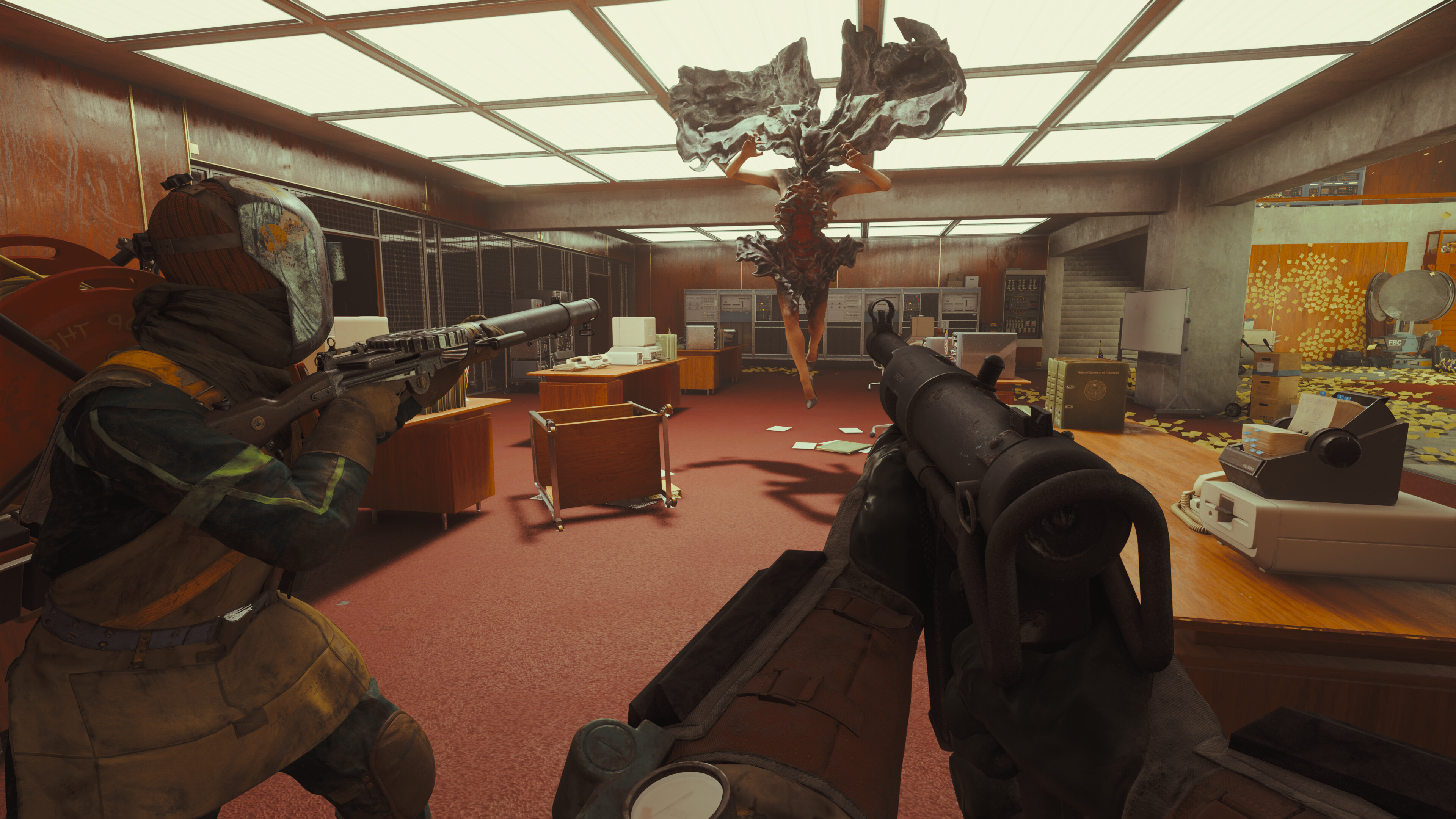 The squad target a strange floating enemy an office environemtn in FBC: Firebreak