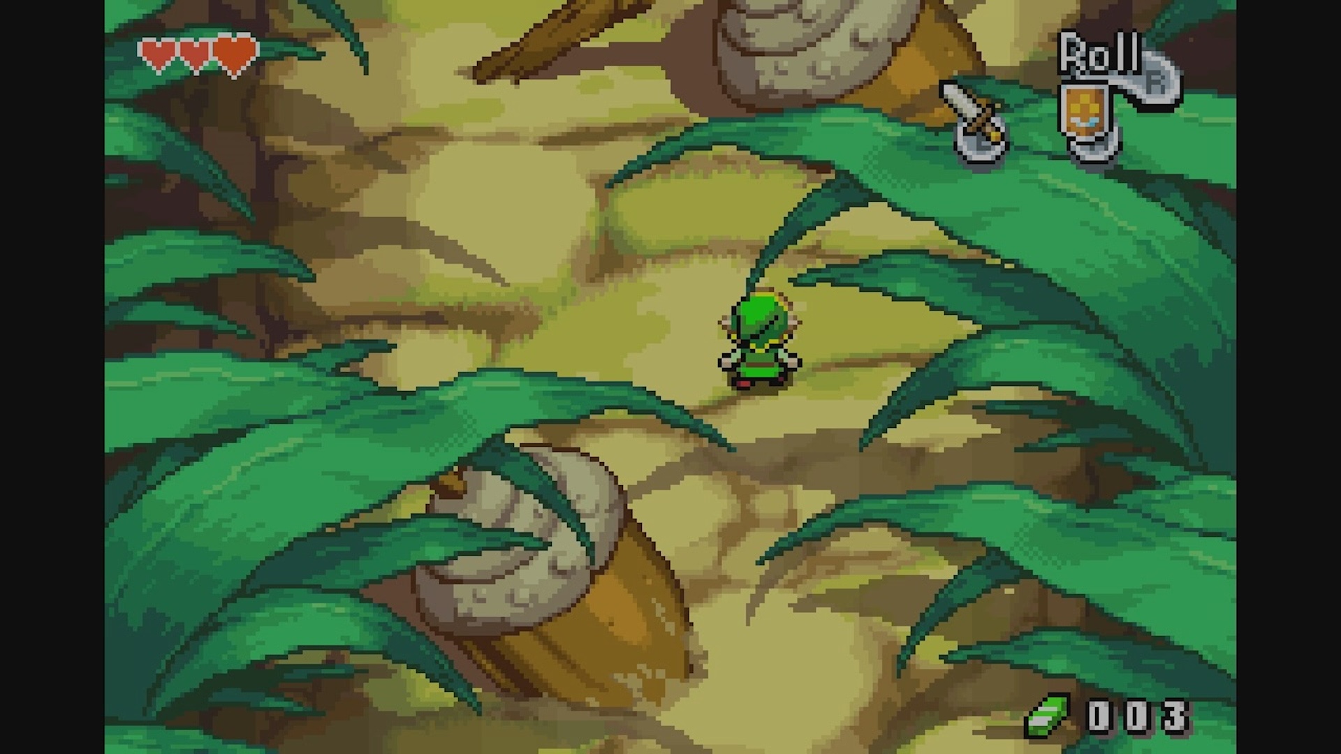 Link standing on a path after he has been shrunk down in The Minish Cap