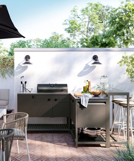 IKEA's B&Aring;TSK&Auml;R Outdoor L-Shaped Kitchen with a connected bar table for seating