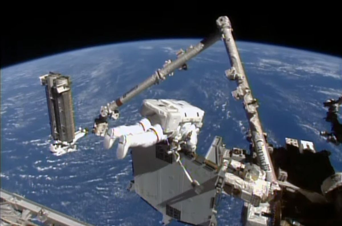 NASA astronauts unfurl 4th solar array outside space station | Space