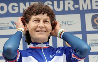 French cycling legend Jeannie Longo poses on the podium after she won her fourth consecutive time trial title at the French national championships in the northern French city of BoulognesurMer on june23 2011 It was 52yearold Longos 58th title from all French championships including track and road cycling AFP PHOTO DENIS CHARLET Photo credit should read DENIS CHARLETAFP via Getty Images