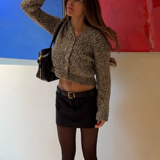 woman wearing slouchy boot outfit 2025