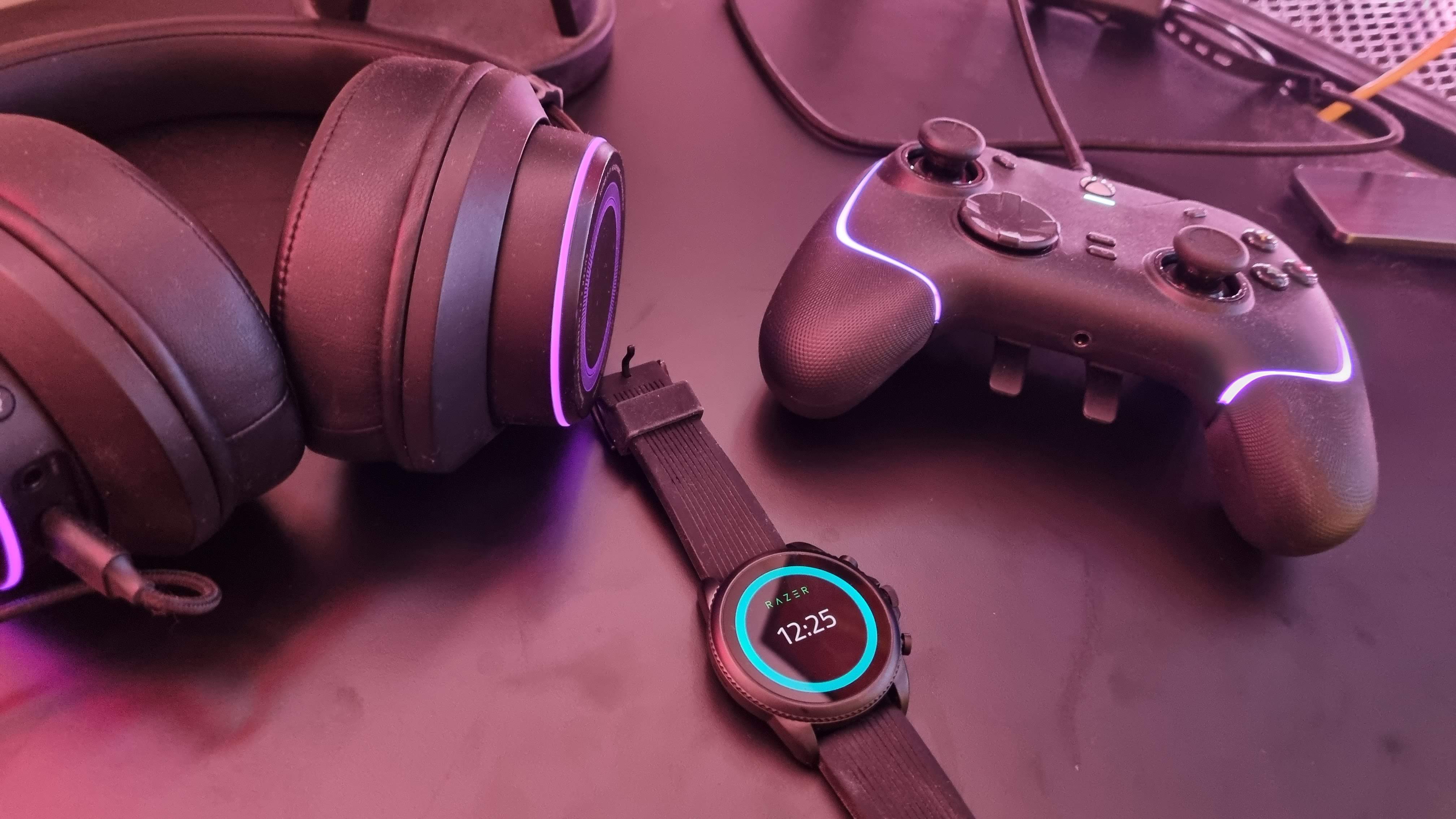 Razer X Fossil Gen 6 smartwatch on a desk with gaming peripherals
