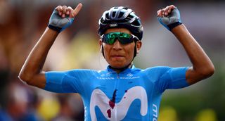 Nairo Quintana crosses the finish line with energy gel spilled on his jersey