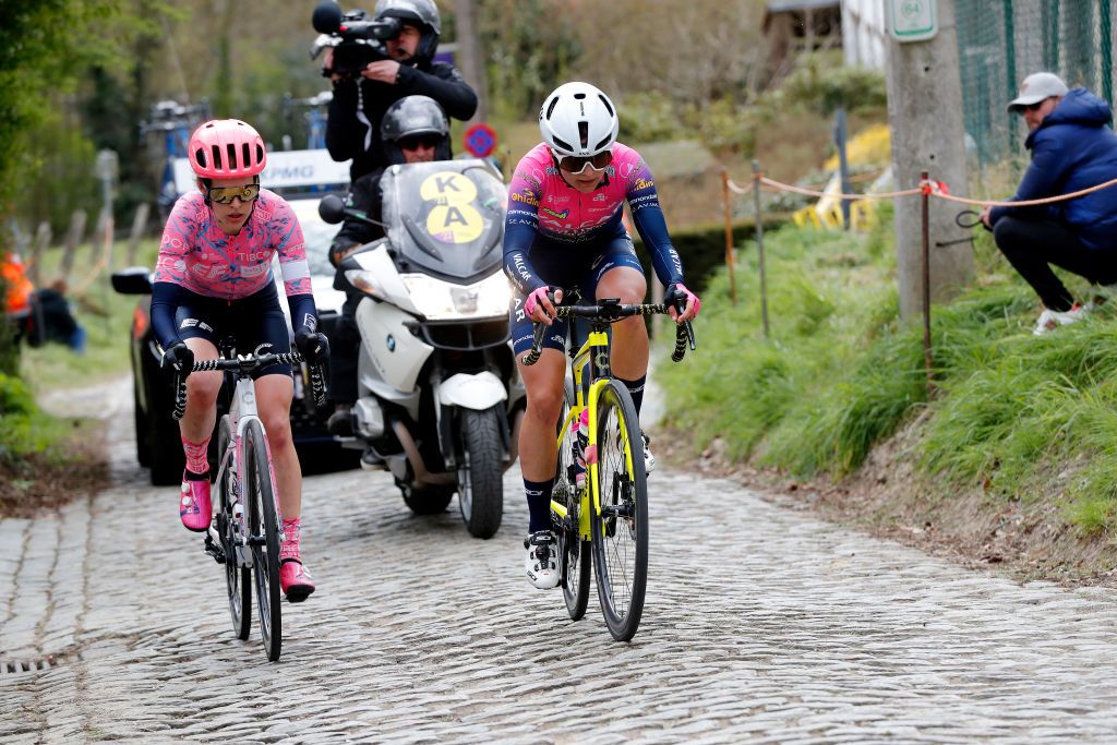 OUDENAARDE BELGIUM APRIL 03 LR Clara Honsinger of United States and Team EF Education Tibco Svb and Olivia Baril of Canada and Team Valcar Travel Service compete in the breakaway through cobblestones sector during the 19th Ronde van Vlaanderen Tour des Flandres 2022 Womens Elite a 1586km one day race from Oudenaarde to Oudenaarde RVV22 RVVwomen on April 03 2022 in Oudenaarde Belgium Photo by Bas CzerwinskiGetty Images