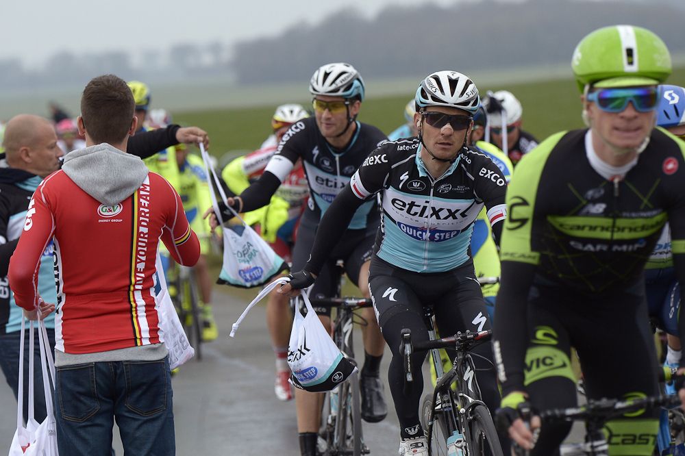 France's Maxime Bouet takes his feeding bag during the second stage.