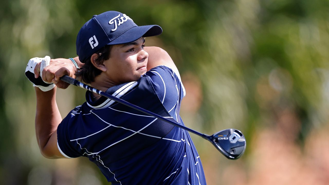 Charlie Woods, son of Tiger Woods, hits a tee shot during pre-qualifying for The Cognizant Classic in The Palm Beaches at Lost Lake Golf Club on February 22, 2024.