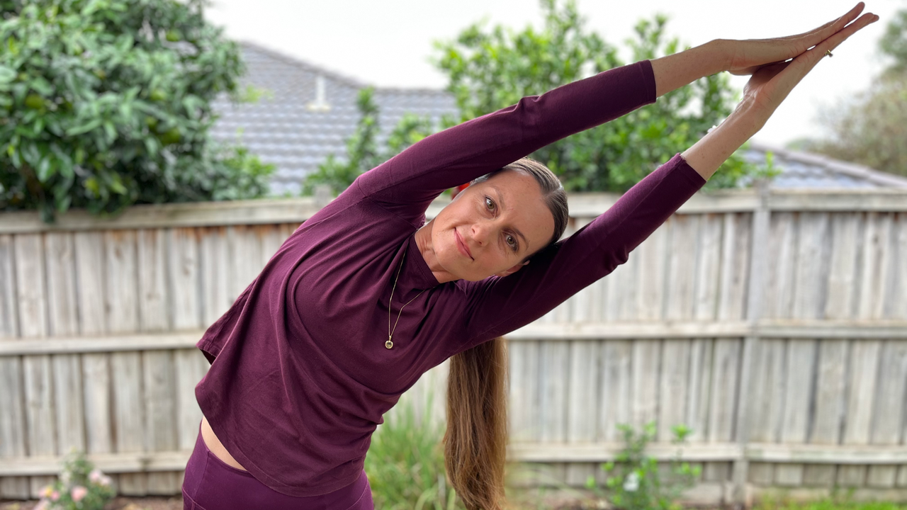 Amy Landry performs a lateral spinal lean