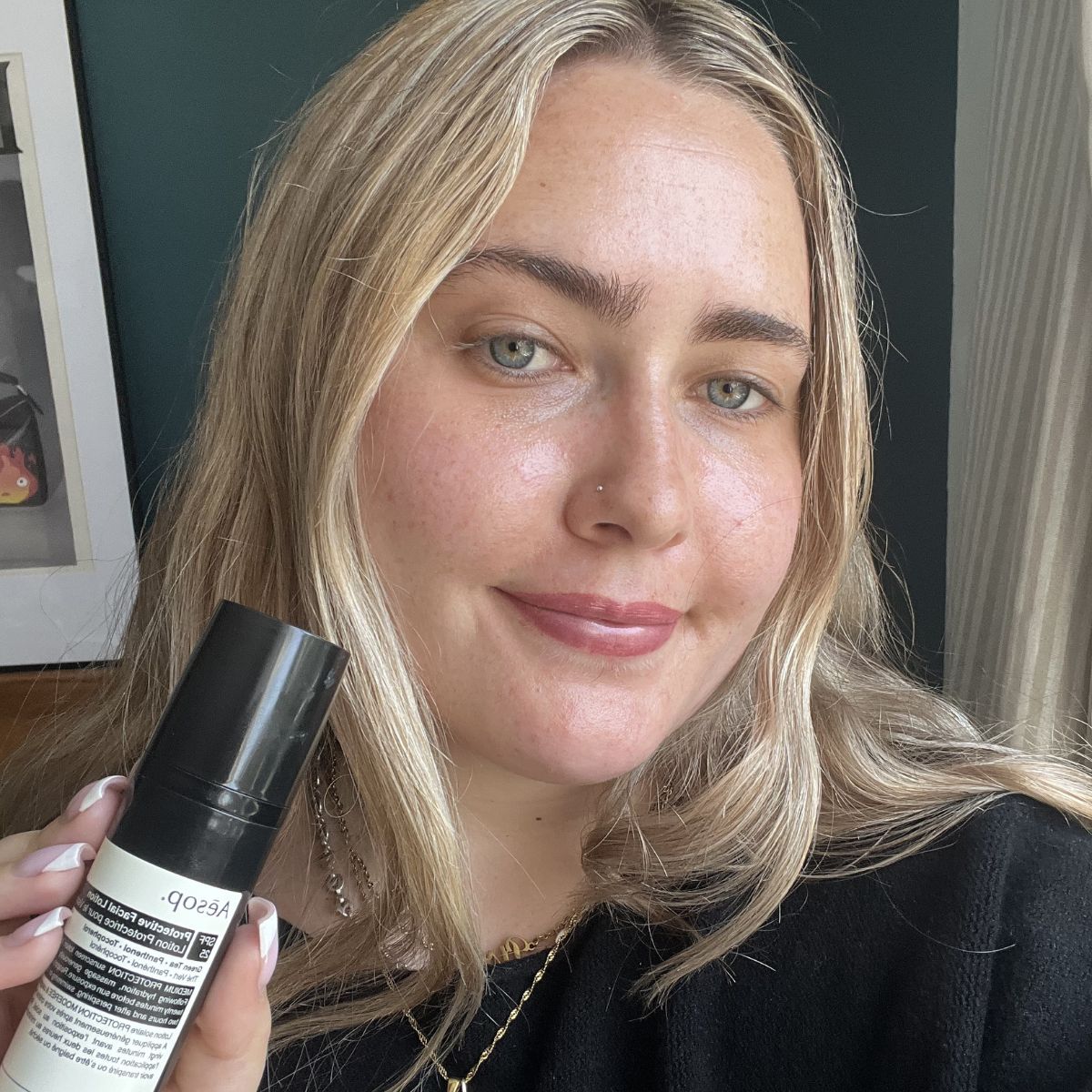 Amelia wearing Aesop Protective Facial Lotion