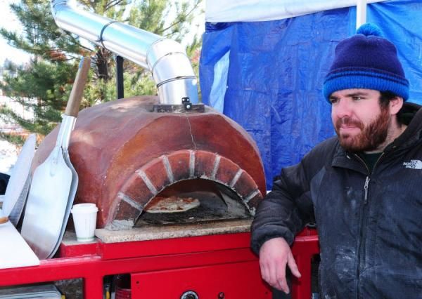 The smallest brick oven in the world is on hand to make little pizzas.