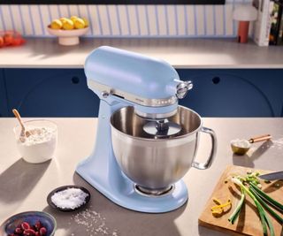 Artisan Stand Mixer in Blue Salt on a kitchen counter.