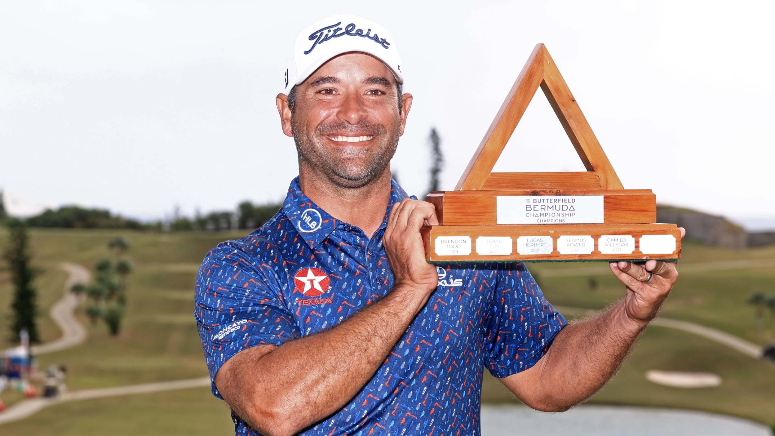 Rafael Campos with the Butterfield Bermuda Championship trophy