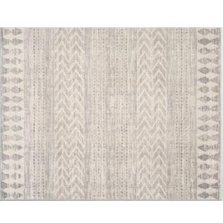 A neutral patterned performance off-white light gray rug
