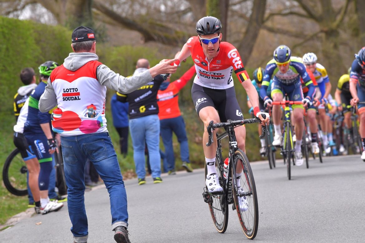 Tim Wellens fuels up for his winning move