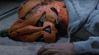 A victim of the Silver Shamrock jack-o-lantern mask in Halloween III: Season of the Witch