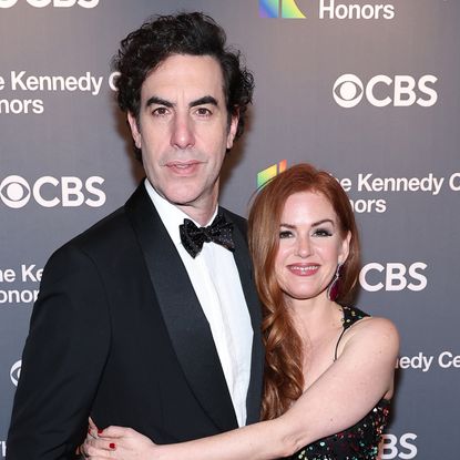 Sacha Cohen and Isla Fisher attend the 45th Kennedy Center Honors ceremony at The Kennedy Center on December 04, 2022 in Washington, DC.