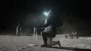 astronaut kneeling on moon
