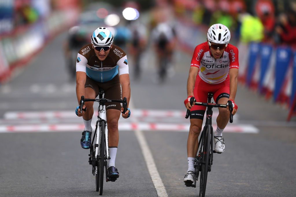 VILLANUEVA DE VALDEGOVIA SPAIN OCTOBER 27 Arrival Nans Peters of France and Team AG2R La Mondiale Guillaume Martin of France and Team Cofidis Solutions Credits during the 75th Tour of Spain 2020 Stage 7 a 1597km from VitoriaGasteiz to Villanueva de Valdegovia lavuelta LaVuelta20 La Vuelta on October 27 2020 in Villanueva de Valdegovia Spain Photo by David RamosGetty Images