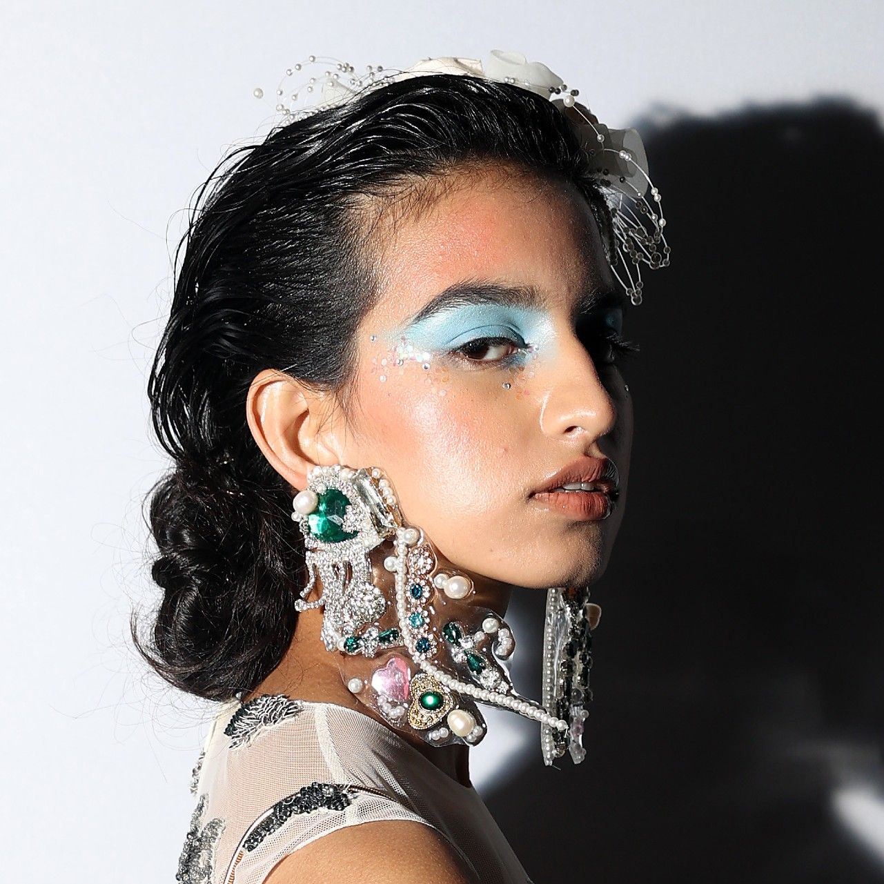 model wearing cream eyeshadow