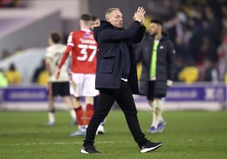 Nottingham Forest manager Steve Cooper applauds the fans at full-time
