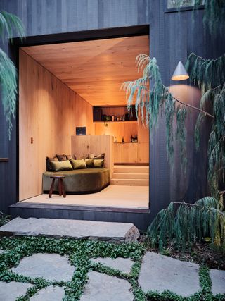 hosono house garden looking inside minimalist wood opening