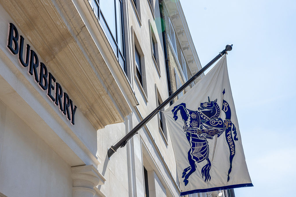 An Equestrian Knight Device logo on a flag outside the Burberry Group Plc luxury boutique in London, UK