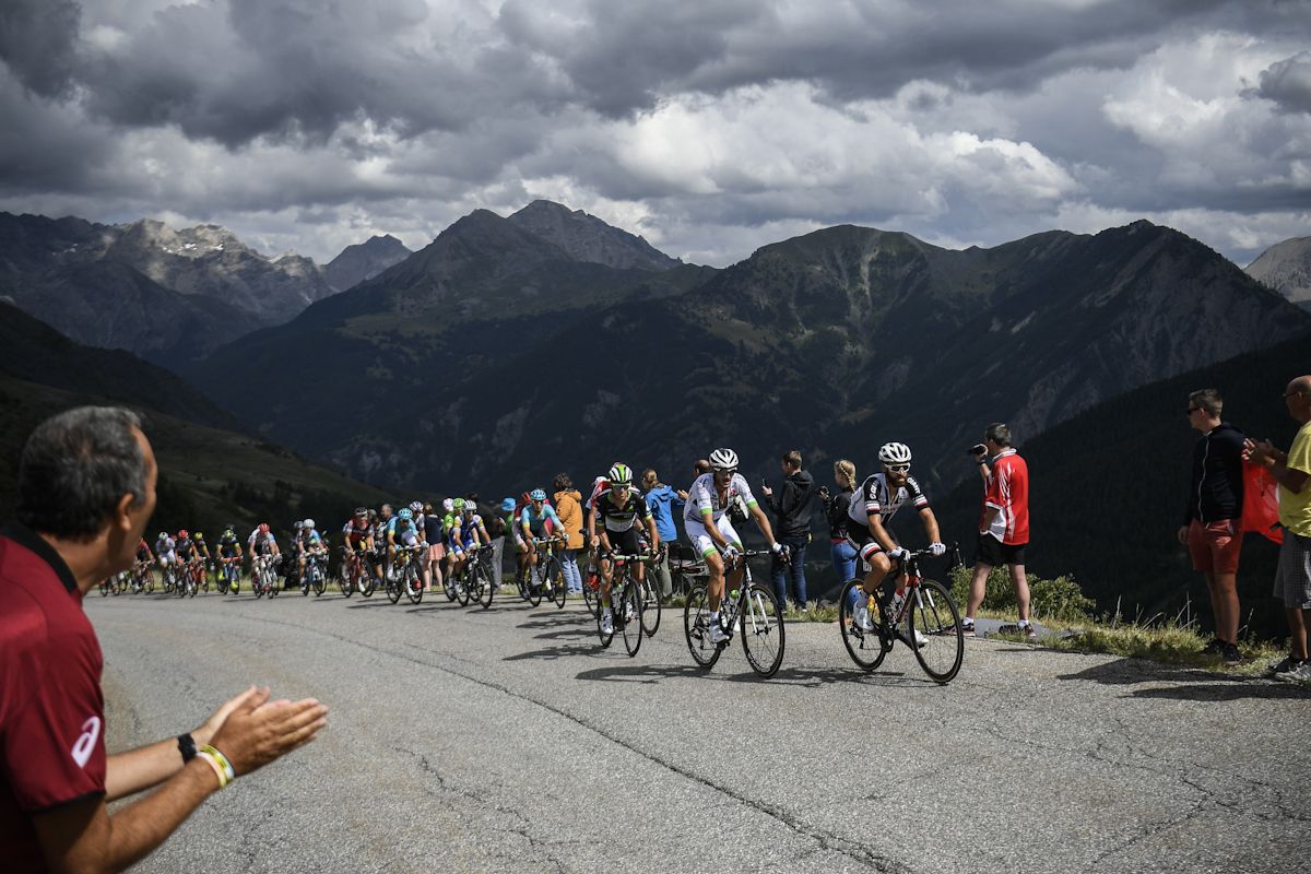The peloton climbs during stage 18 at the Tour de France