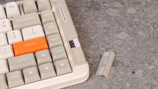 A retro-looking McHose X75 V2 wireless mechanical keyboard