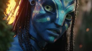 Zoe Saldana, as Neytiri te Tskaha Mo'at'ite looking at the camera during Avatar.