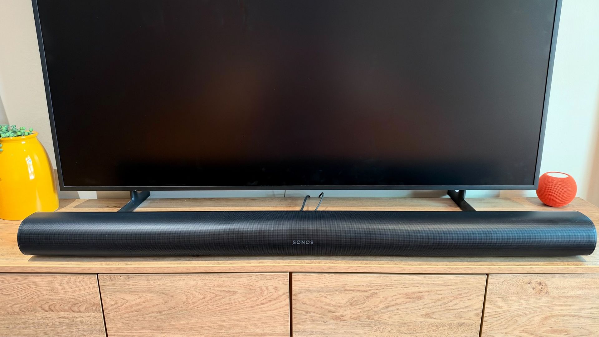Sonos Arc soundbar on a TV unit.