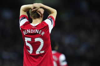 Nicklas Bendtner looks dejected after Arsenal's League Cup final defeat to Birmingham City in February 2011.
