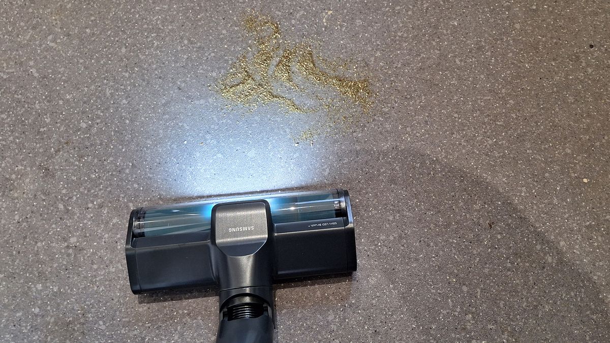 During fine debris suction test on lino using Samsung Bespoke AI Jet Ultra