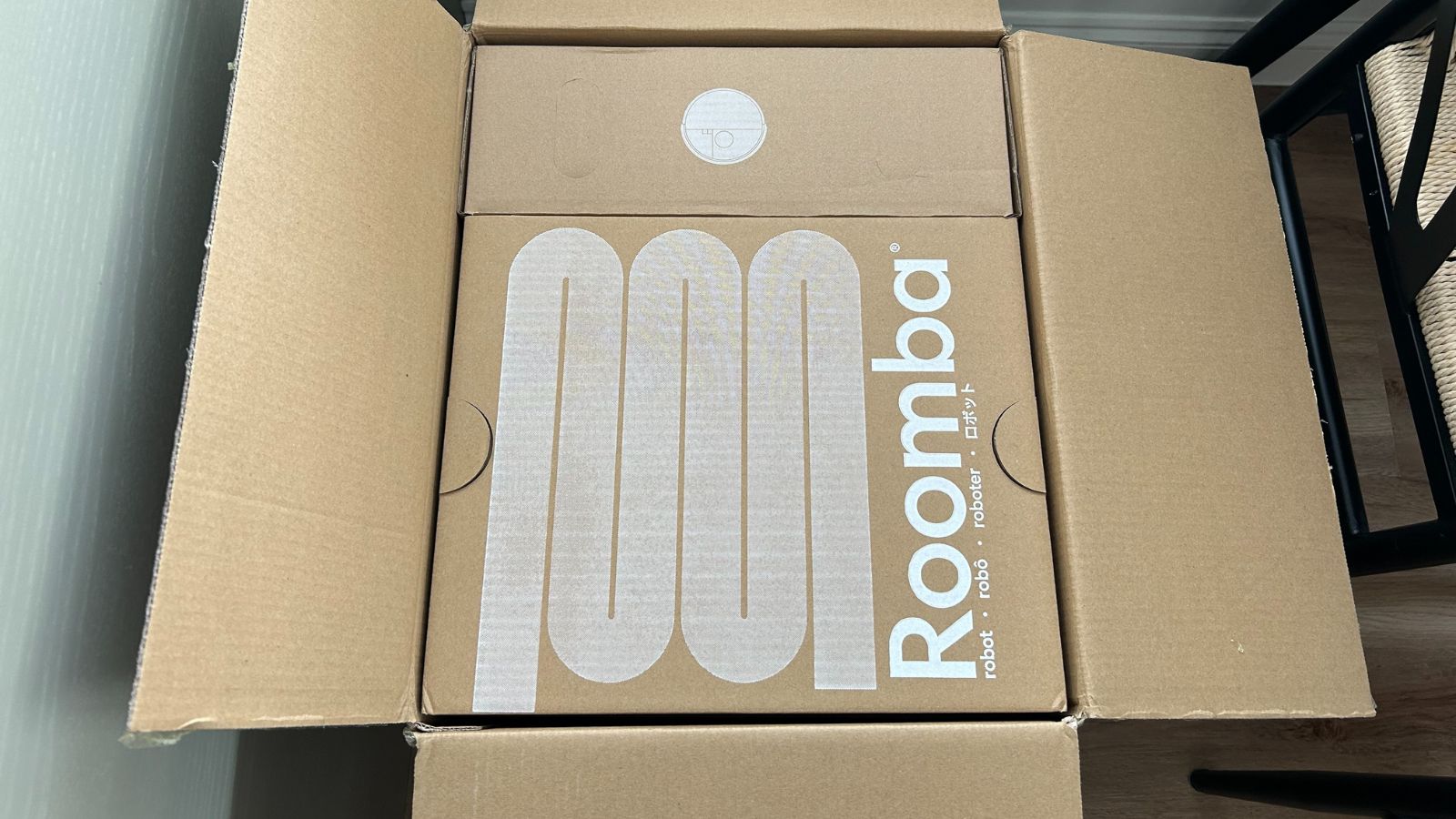 Roomba 505 Plus robot vacuum in box